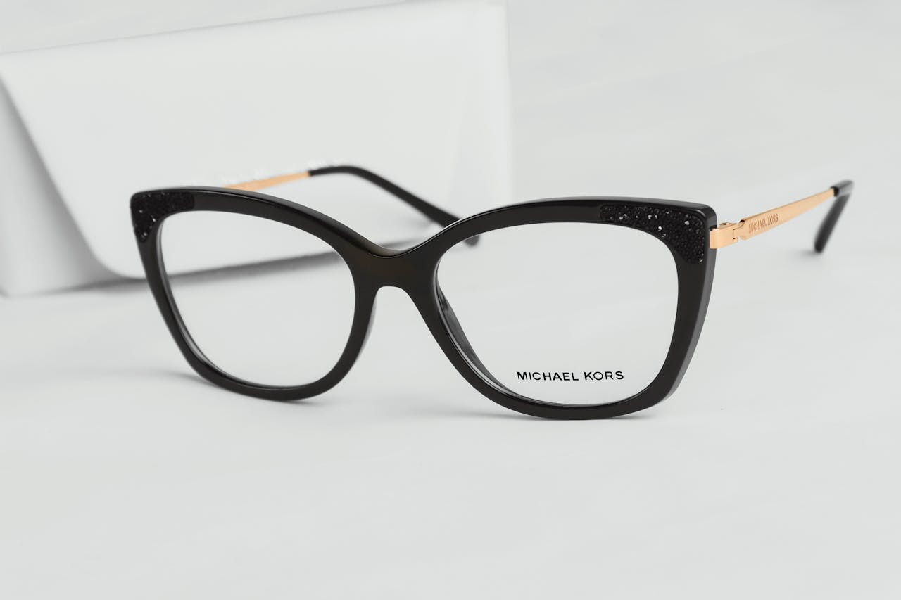 Chic black cat eye eyeglasses by Michael Kors with luxurious design accents.